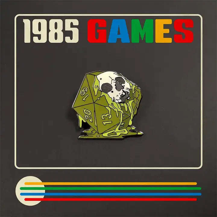 1985 Games Melt Skull D20 pin | Tables and Towers